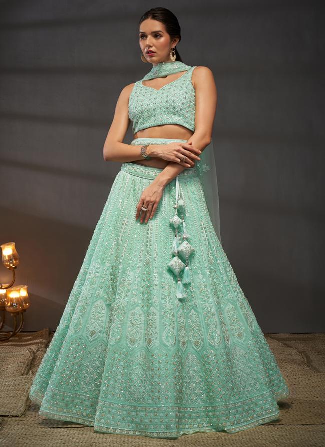 Net Turquoise Blue Bridal Wear Sequins Work Lehenga Choli